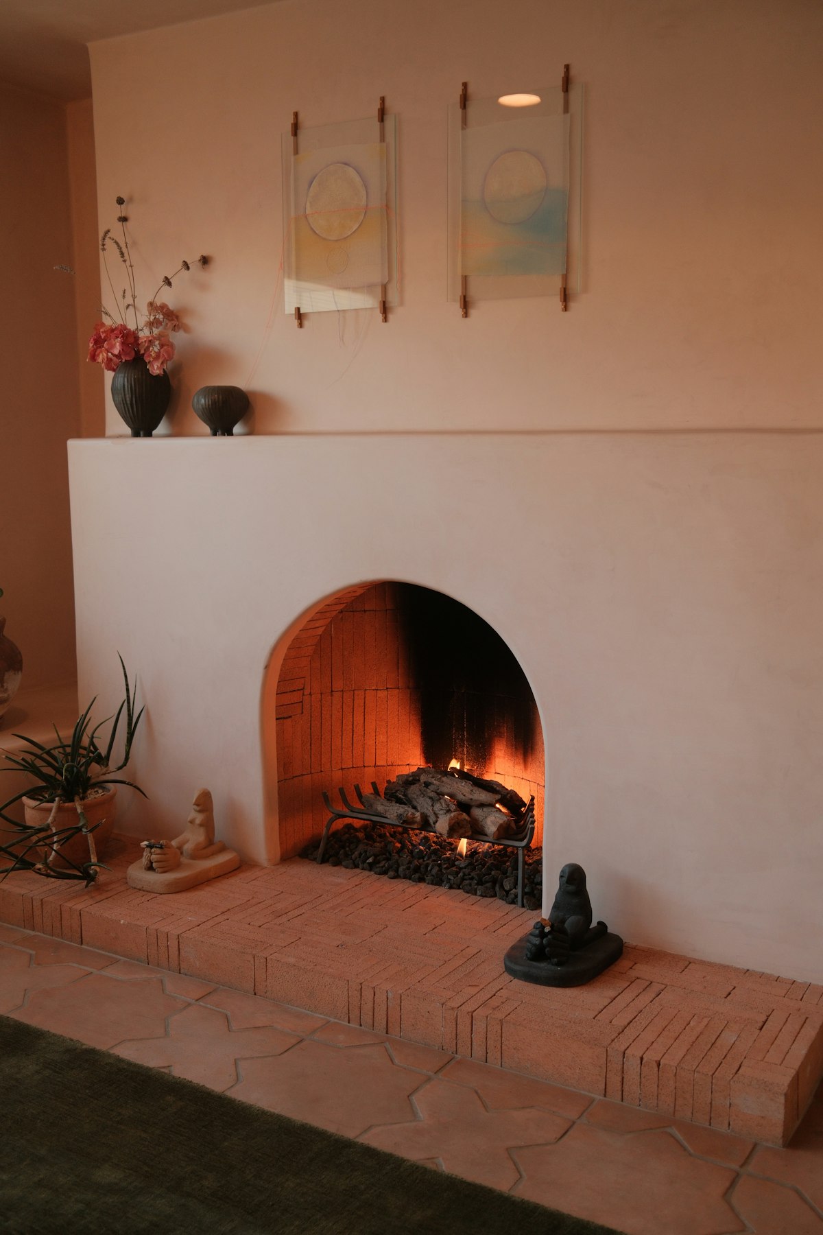 Cozy fireplace with burning logs